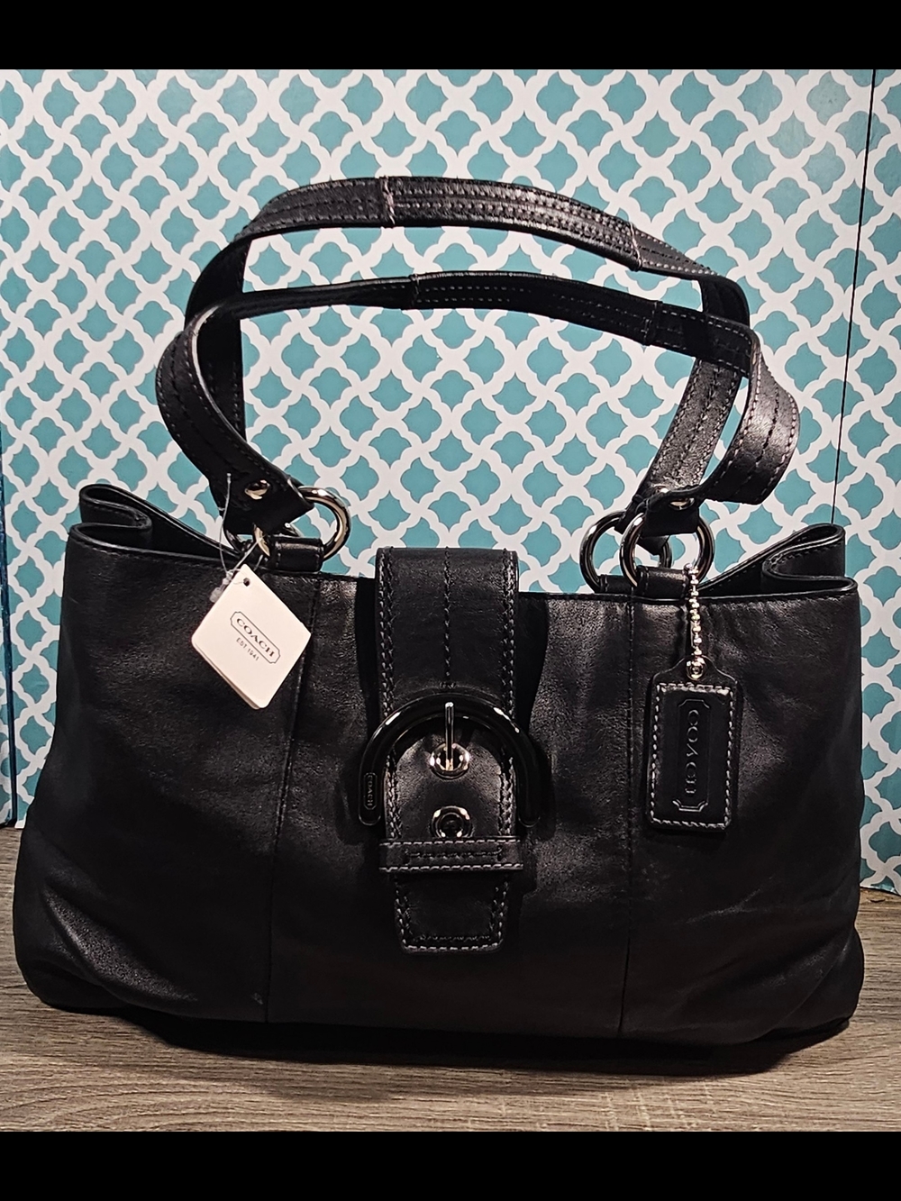 Coach Soho East West Tote Black w Silver Hardware, buckle closure Bottom feet